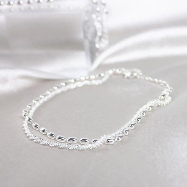 Silverarmband, justerbar längd, påse ingår (2 stycken)
