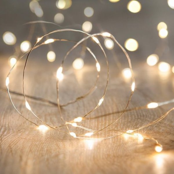 50 LED-mikrovalosarjaa lämpimän valkoinen paristoilla