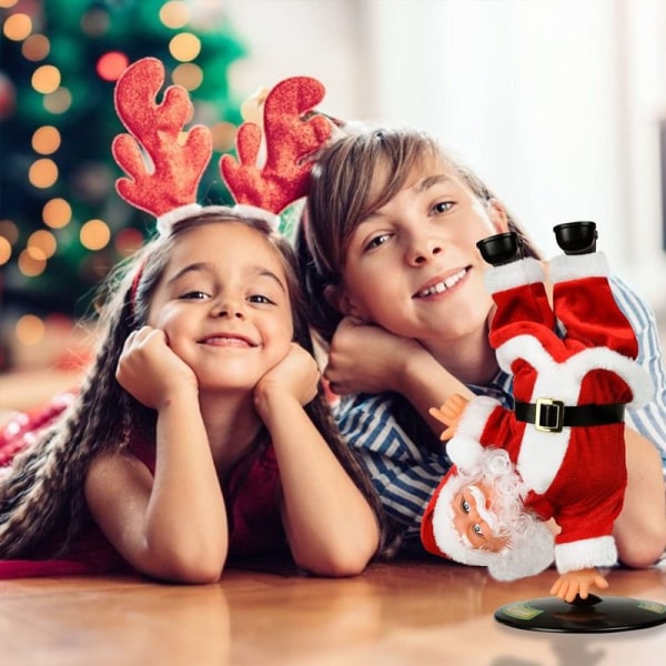 Jultomte med roterande huvud, elektrisk julmusikal