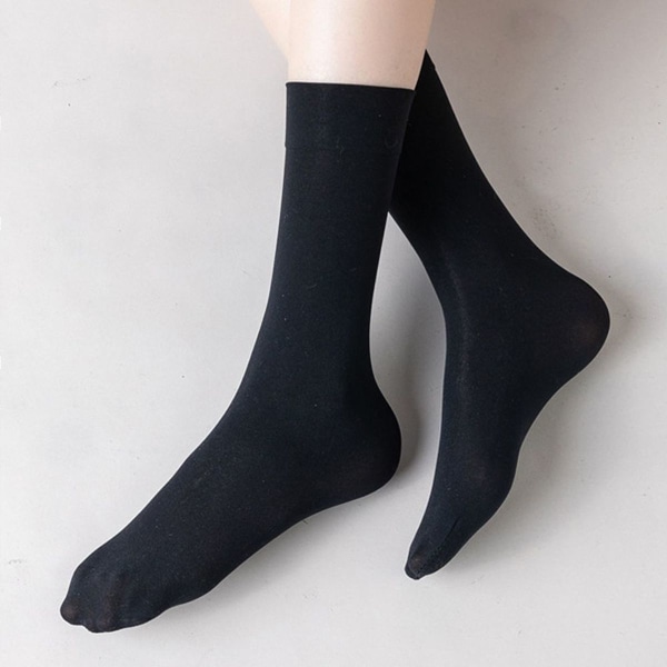Gjennomsiktige knær i silke. Mid-top sokker sorte 27 cm KLB