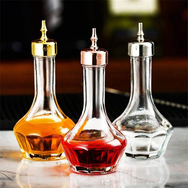 Bitters-flaske i glas med dash-flaske - Professionelt barværktøj med låg i rosaguld