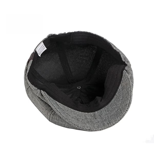 En mørkegrå unisex brød knap cap, avis cap, ottekantet cap til mænd