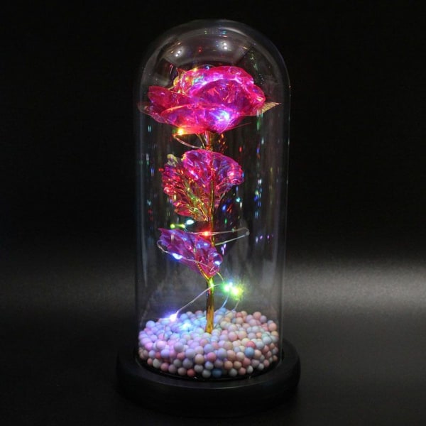 LED-koristeruusuja ja LED-valoja lasikupolin ruususarjassa kodin sisustukseen, syntymäpäiville