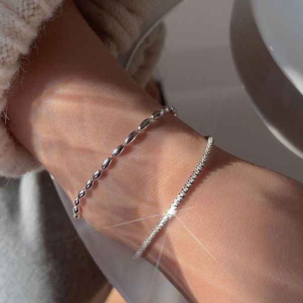 Silverarmband, justerbar längd, påse ingår (2 stycken)