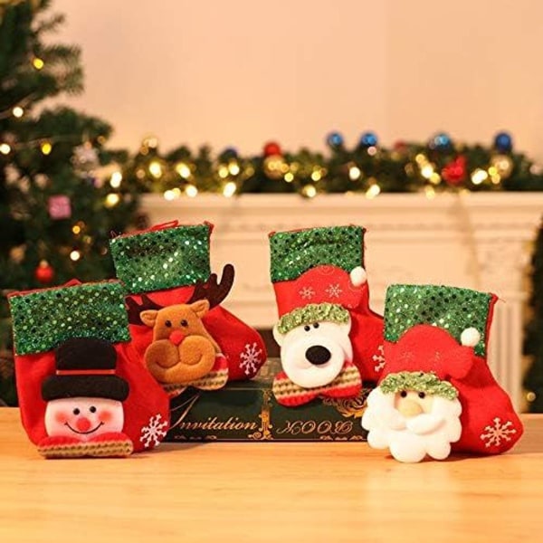 Pienet joulusukat, lasten sukat, joulupukki, lumiukko, poro, KLB