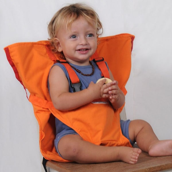 Bærbar justerbar baby-spisestolstropp er en oransje KLB du må ha