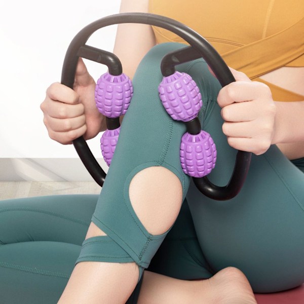 Lihashierontarulla, faskia- ja hierontalaite kahvalla itsehierontaan. Violetti