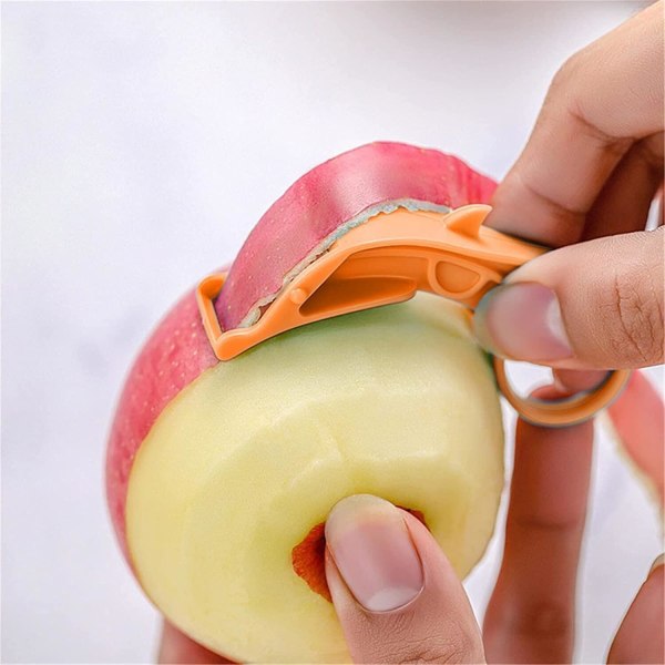 2 användningsområden Ring Skalare Multifunktionell Plast Bärbar Skrapande Skivmaskin Fruktskalare Köksredskap för citronapelsin, apelsin