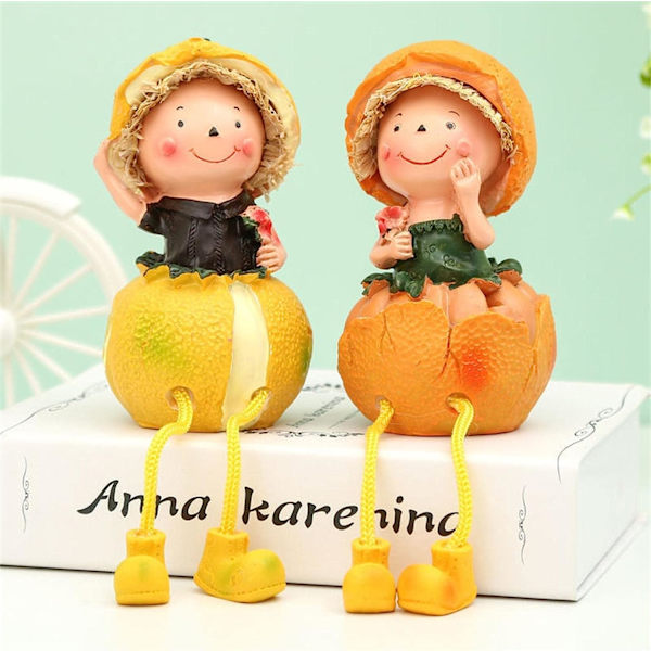 Söta orange flicka docka statyer kawaii långa ben resin figurin dekor