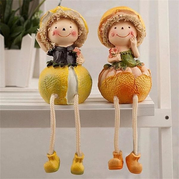 Söta orange flicka docka statyer kawaii långa ben resin figurin dekor