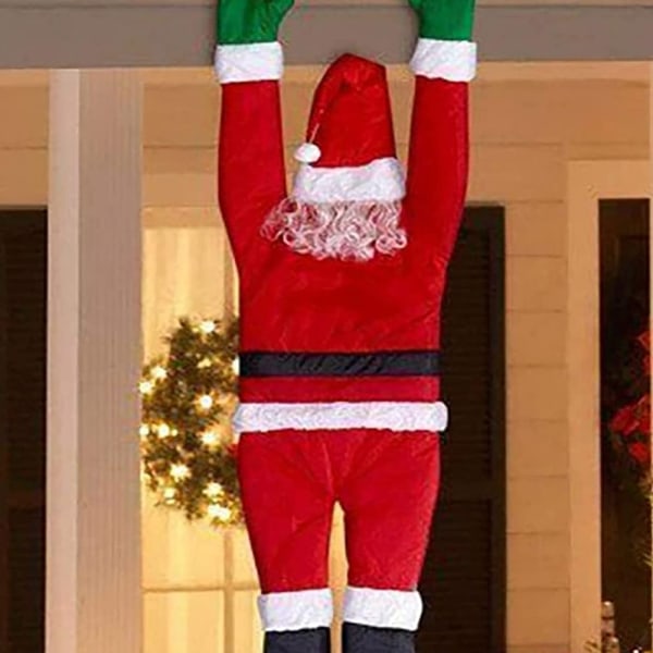 Flannelett Santa Claus klättrar på väggdekorationen
