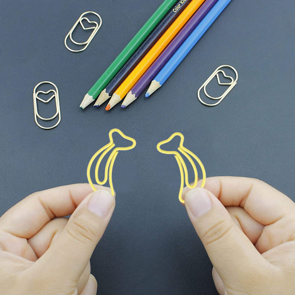 100 st papperklämmor bärbar mini söt bananform rostfri förkromad metall pappersklämmor kontorsbokmärkesklämmor