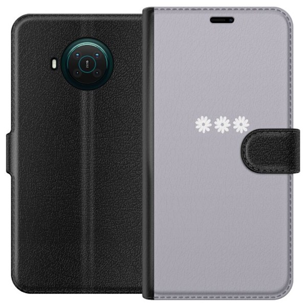 Nokia X10 Lompakkokotelo Lila Blomminimalismi - tyylikäs kukkakuva lila taustalla