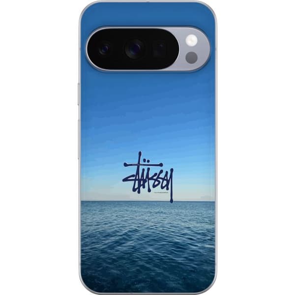 Kompatibelt Mobildeksel til Google Pixel 10 Pro Havspanorama med blå himmel og stilig surf-inspirert logo blå