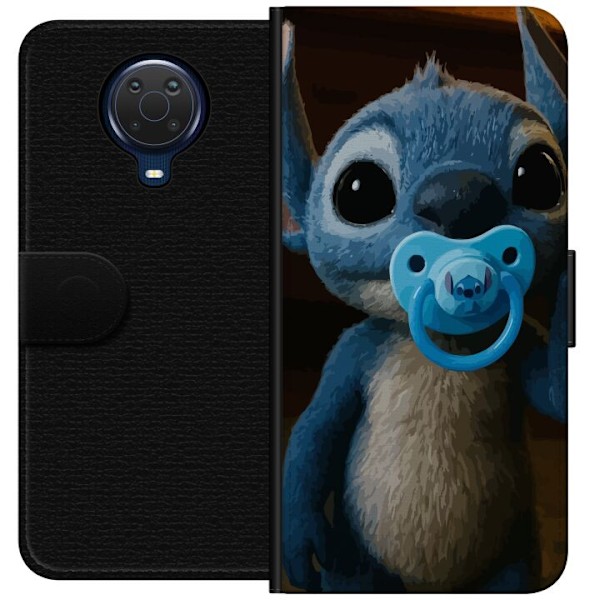 Nokia G20 Lompakkokotelo Stitch & Napp - vauvateema söpöllä hahmolla