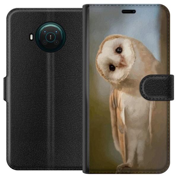 Nokia X10 Lompakkokotelo Uggla Utelias Katse Lintumotiivi Metsä Luonto Grafinen Suunnittelu Suosittu Motiivi Eläin Teema Koriste