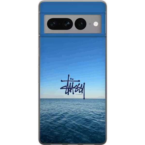 Kompatibelt Mobildeksel til Google Pixel 7 Pro Havspanorama med blå himmel og stilig surf-inspirert logo blå