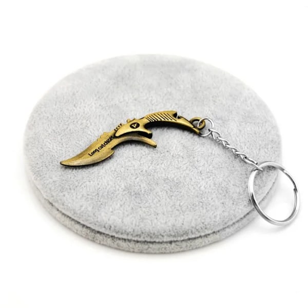 Højkvalitets ny stil Nyhed Counter Strike Pistol Ak47 Nøglering Mænd Ornament Awp Riffel Sniper Cs Go Saber Mænd Taske Bil Nøglering Smykker Souv Anti Gold Dagger