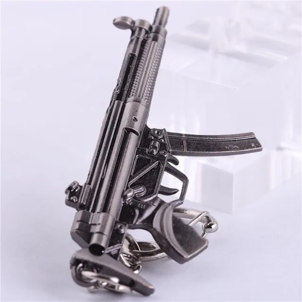 Højkvalitets ny stil Nyhed Counter Strike Pistol Ak47 Nøglering Mænd Ornament Awp Riffel Sniper Cs Go Saber Herretasker Bil Nøglering Smykker Souvenirs 23