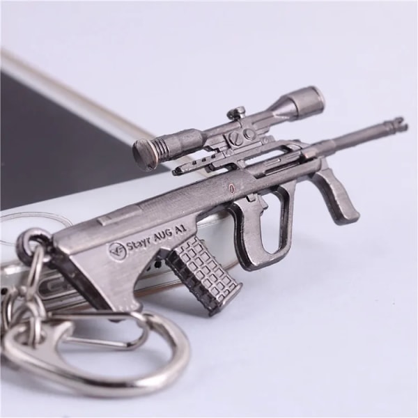 Højkvalitets ny stil Nyhed Counter Strike Pistol Ak47 Nøglering Mænd Ornament Awp Riffel Sniper Cs Go Saber Herre Taske Bil Nøglering Smykker Souvenirs 24