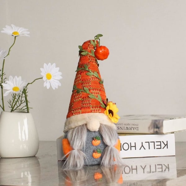 Jultomte, plyschsolrosalver, höstpumpa docka, svensk