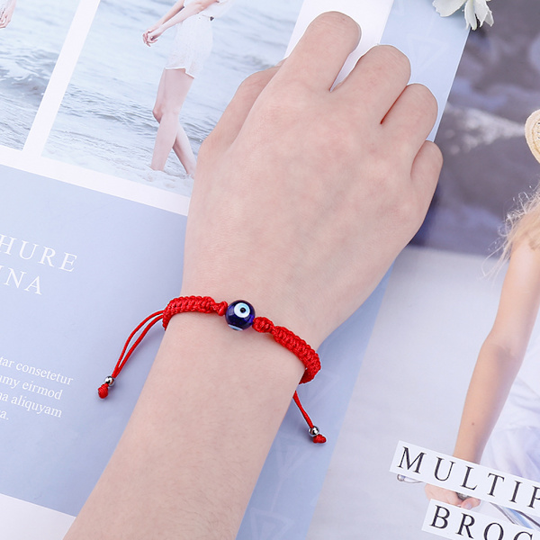 Justerbart armband, djävulens öga, röd tråd
