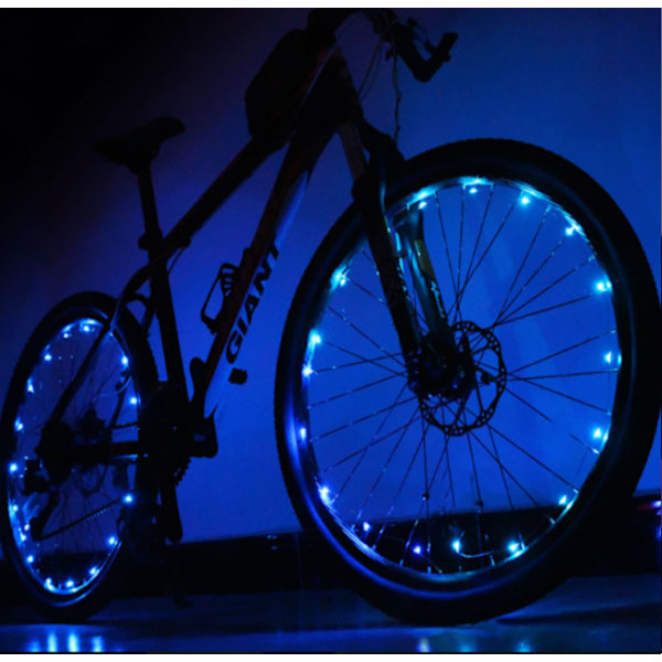 Blå LED-cykelhjulsljus i ett stycke ger ljusstyrka och synlighet