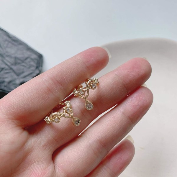 Uten Pierced Ear Bone Folder Punk Fashion Ear Cuff Wrap Rhines