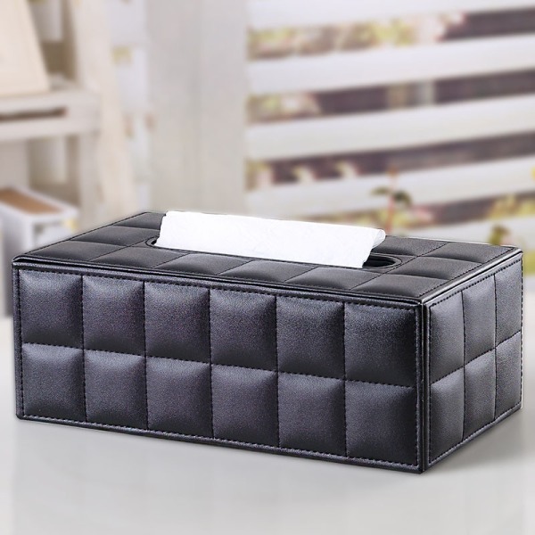En svart fårskinn läder tissue box, en rektangulär kosmetisk
