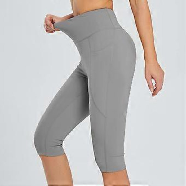 Naisten polvipituiset capri-leggingsit taskuilla rentoon treeniin, kesäiset korkeavyötäröiset joogahousut, leggingsit Khaki L (L Khaki)