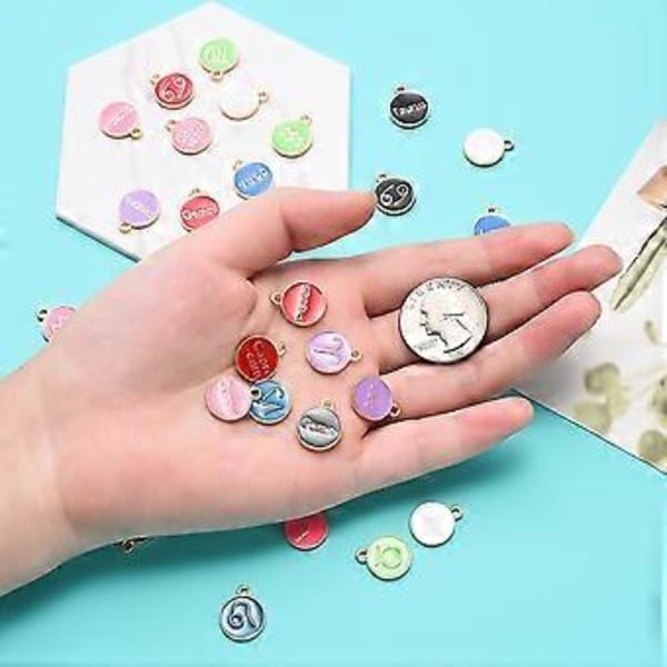 12 horoskooppimerkkiä pyöreitä riipuksia, DIY rannekoru kaulakorun valmistustarvikkeet vaaleanpunainen