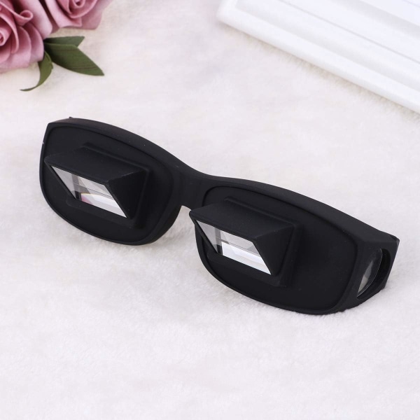 (svart) Stora horisontella lata glasögon liggande på sängen, läsning, observation, högupplöst, p