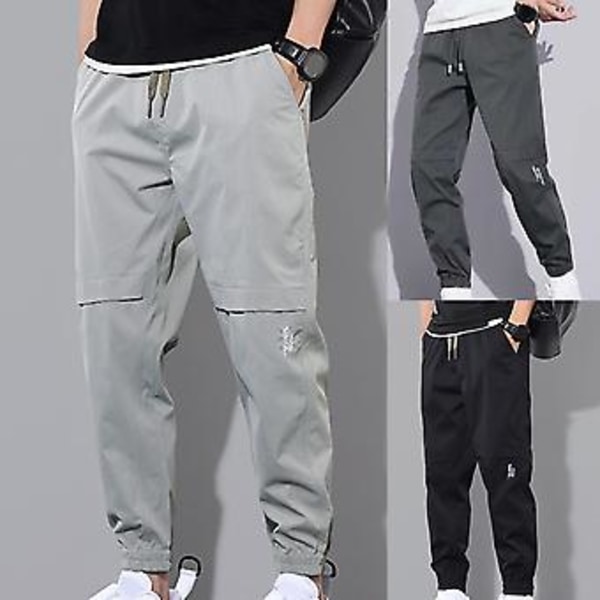 Fianao Herrbyxor Solid Färg Elastisk Midja Snörning Ankelbandade Cargo Byxor för Dagligt Bruk (3XL Svart)