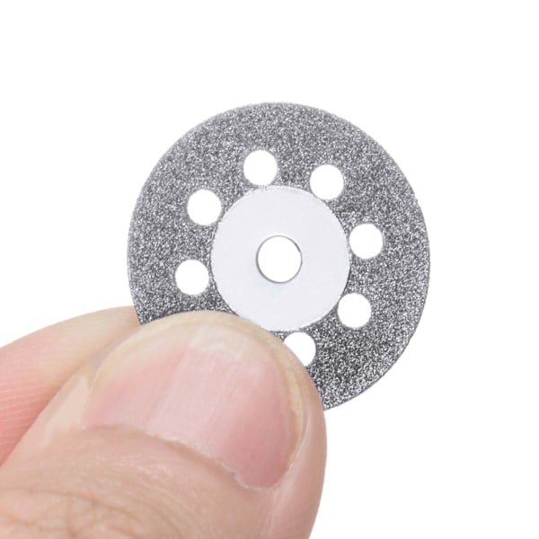 20 kpl 22 mm timanttileikkuulevyä, 4 kpl 3 mm istukka ja 2 kpl risti