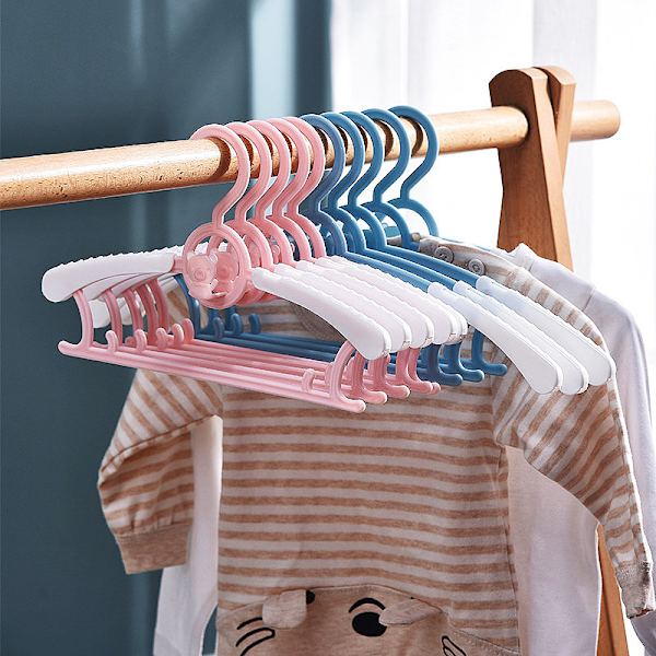 20 sammenklappelige børnetøjshængere i pink, grøn, gul,
