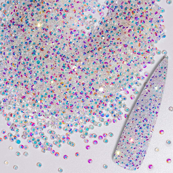 10 000 kappaletta 1,2 mm:n sateenkaaren värisiä minikokoisia lasi-timantteja luovaan käyttöön