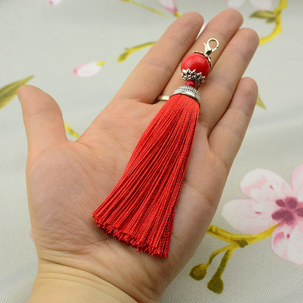 10:a hummerspänne tofs nyckel tofs DIY litet tofs hänge röd