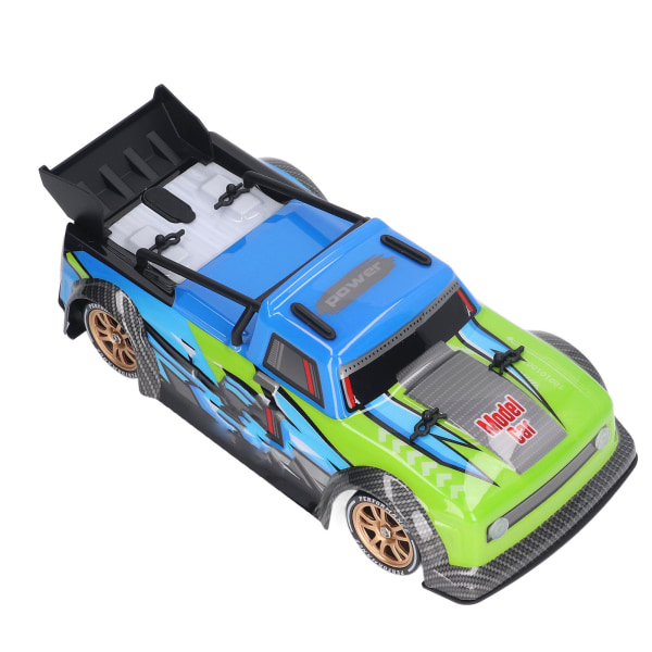 Fjärrkontroll Driftbil med LED-ljus 1/16 Skala RC Sportracerbil med avgaseffekt för vuxna Barn Blå