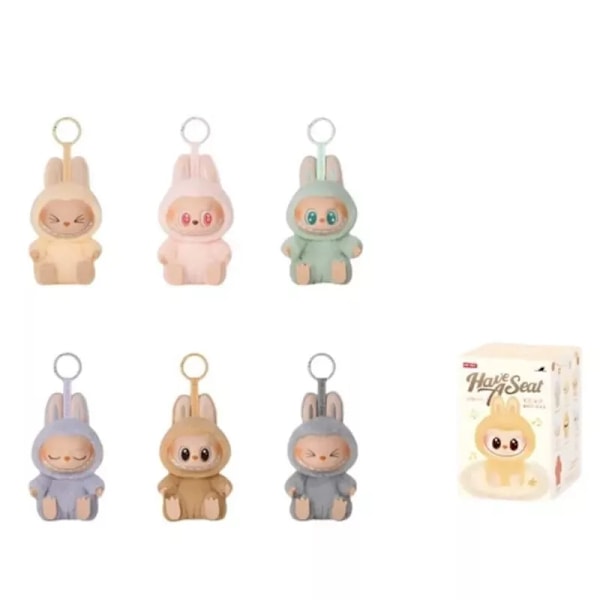 Pop Mart Labubu The Monsters – Spännande Macaron Plysch Nyckelring Serie (1 Blind Box, 2.0) coy 2