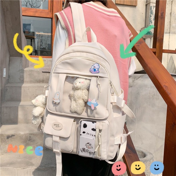 uudentyylinen reppu naisten korealaistyylinen opiskelijalaukku perus- ja yläkoulun oppilaslaukku nylon suurikapasiteettinen reppu White Bag with pendant badge card