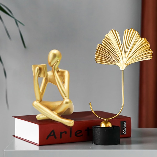 Guldläsande kvinnostatue, tänkarskulpturer, abstrakt konstprydnad.PR