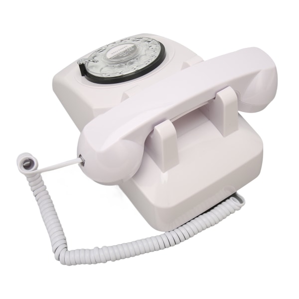 Retro pyörivä puhelin Vanhanaikainen vintage lankapuhelin mekaanisella soittoäänellä kotitalouksien toimistohotelliin White