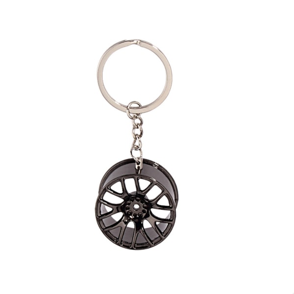 Muodikas yksinkertainen metallinen auton pyörän muotoinen riipus avaimenperän koristelu Kiva lahja