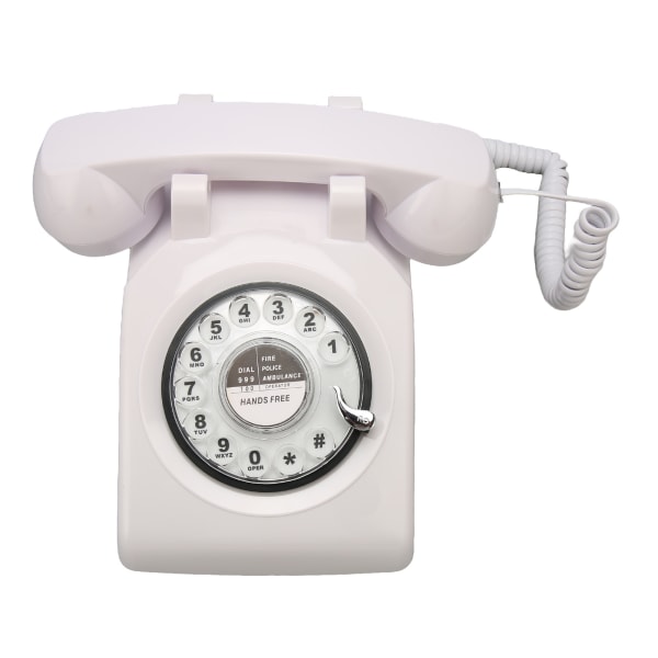 Retro pyörivä puhelin Vanhanaikainen vintage lankapuhelin mekaanisella soittoäänellä kotitalouksien toimistohotelliin White