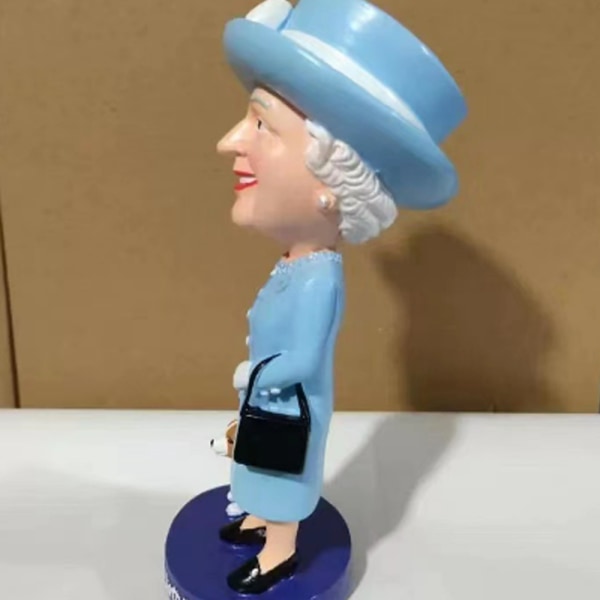 Dronning Elizabeth hvalpedukke dekoration statue