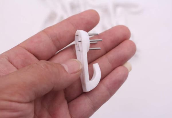 10 st plast vita hållbara Hardwall Hanger Multi-purpose Non-trace Hook Används för hårdvarufästen Sömlös baksida