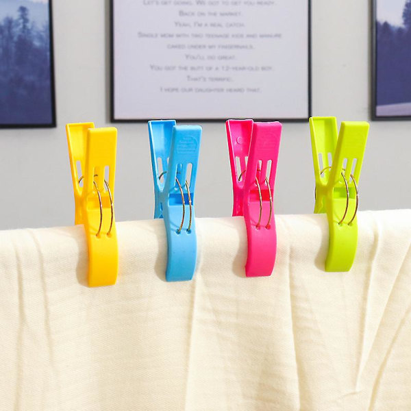 Pakke med 8 store, lyse farger, plast strandhåndklepinner. Klips til solseng Farge tilfeldig
