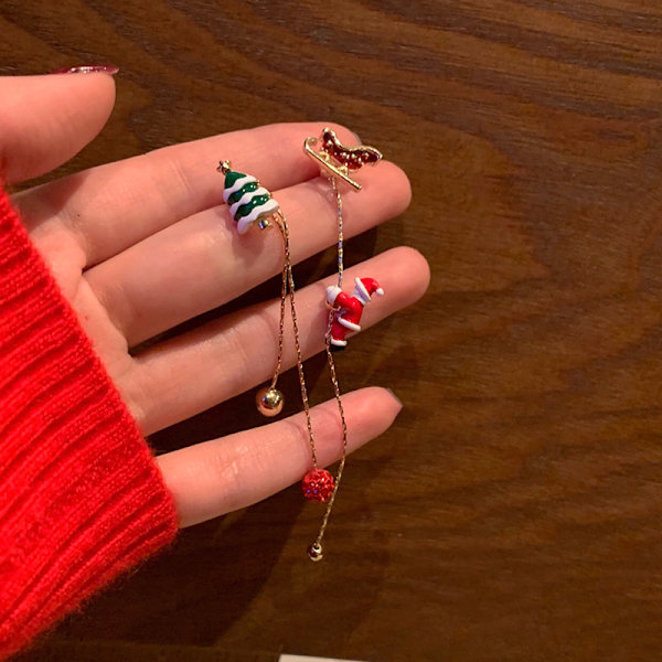 Asymmetriska silverfärgade nålformade klätterbara tomte-hängeörhängen Julörhängen modeörhängen