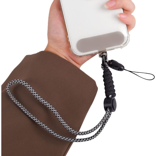 Kompatibel med universal mobiltelefonsnor Bærbar håndledssnor Justerbar anti-tabte telefonhåndledsstropper Snor, der er kompatibel med alle smartphones-Bl