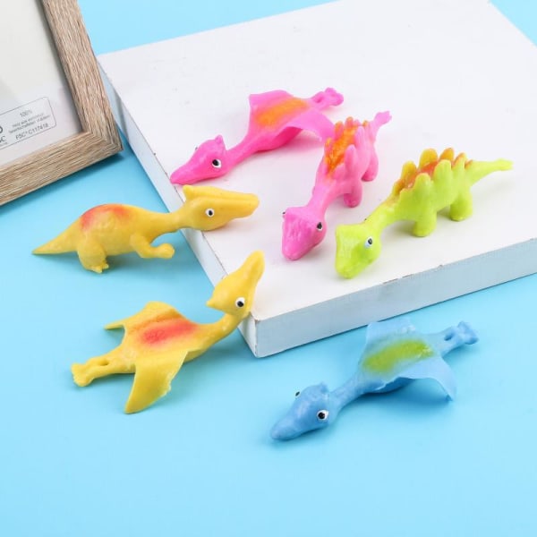 Udtrækkelige flyvende dinosaurer (sæt med 4, blandet hår) - ideel som overraskelsestaske eller gave til børn.